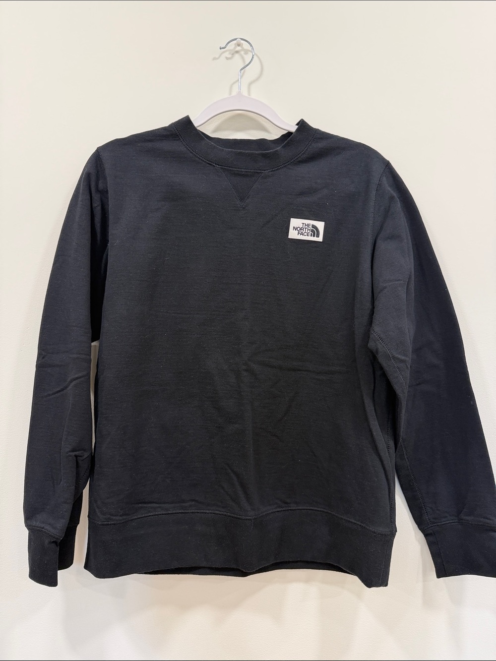 The North Face woman’s Black Crewneck Sweatshirt